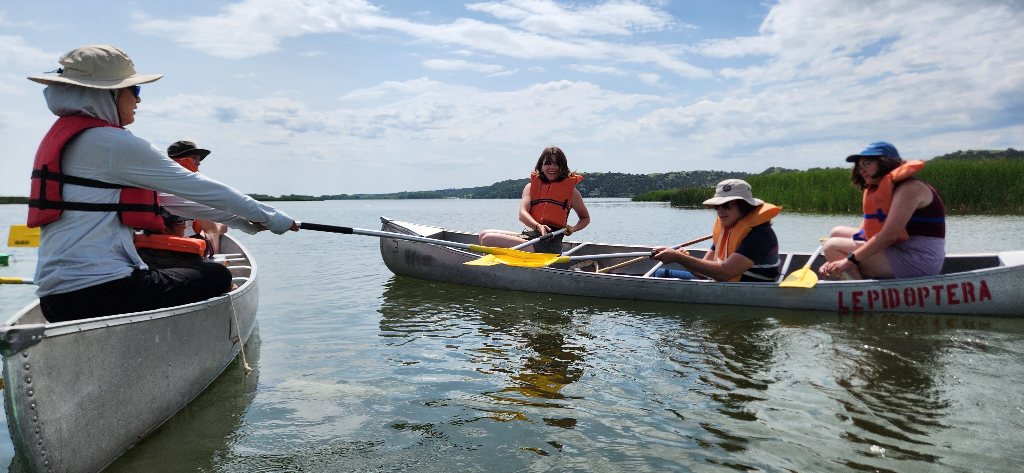 Student's crossing paddles