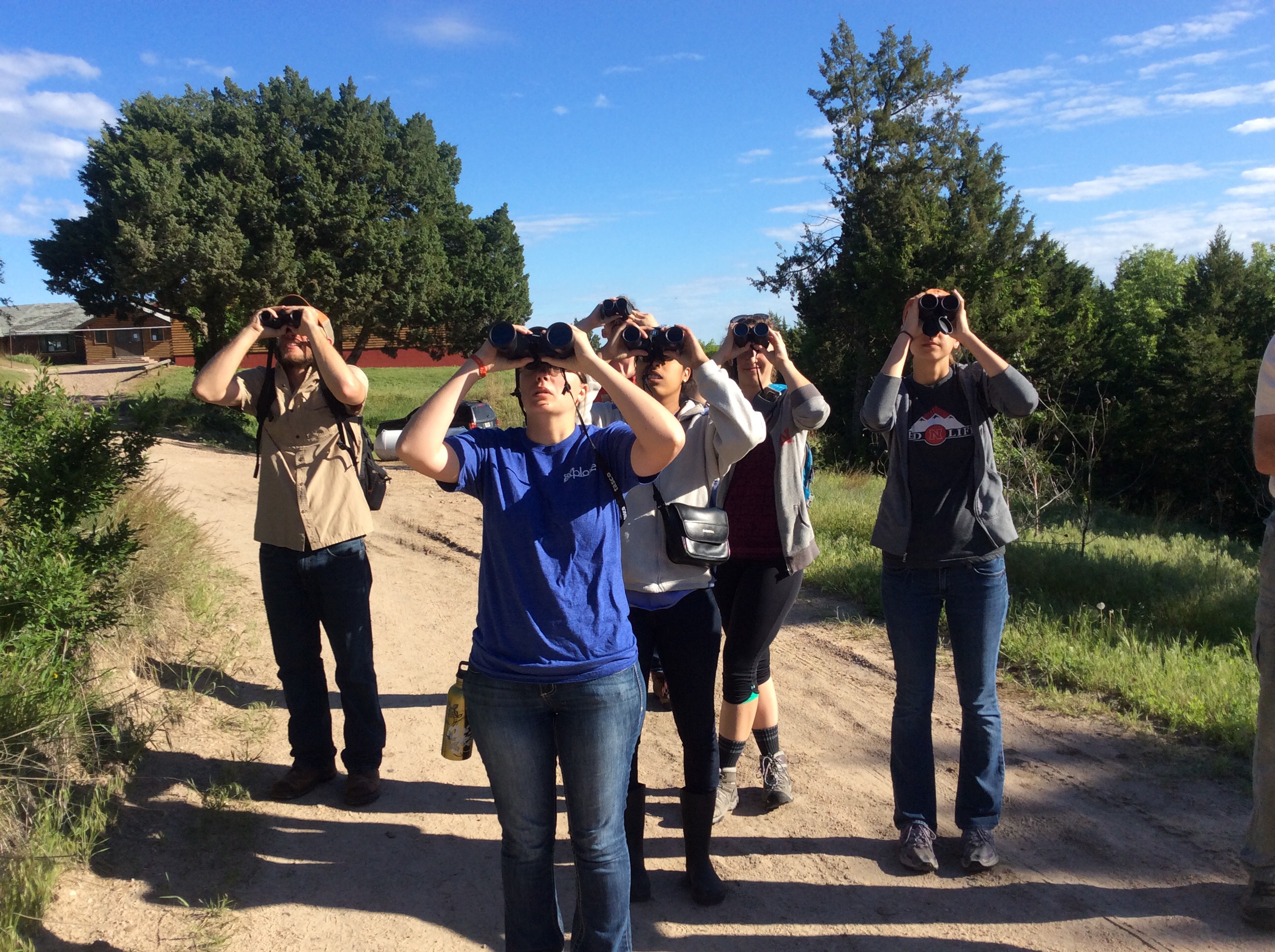 Group looking at something with binoculars